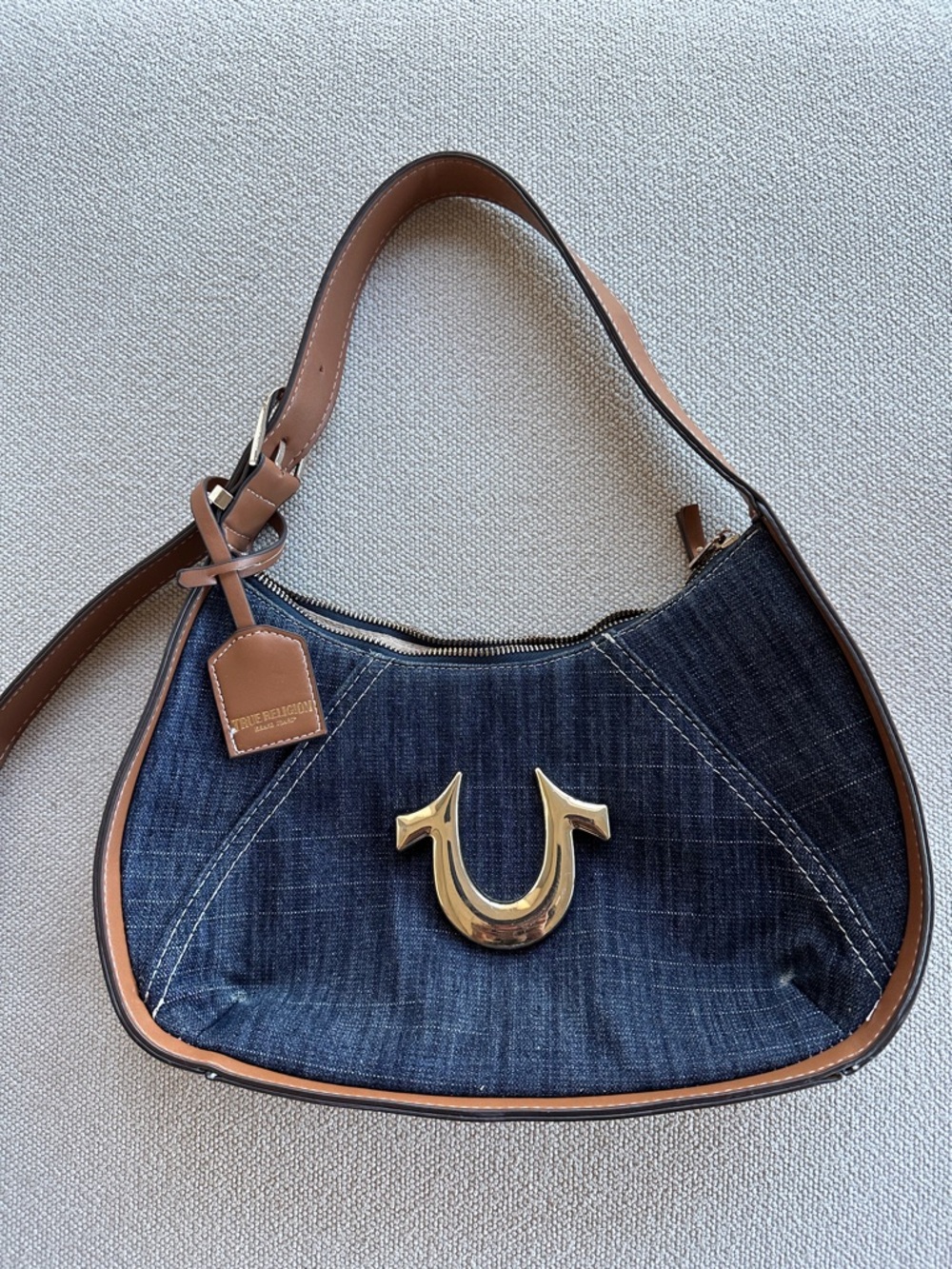 True Religion Dark Blue Denim Shoulder Bag with a Brown Trim and Gold Logo